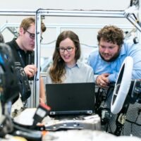 A sleek infographic-style layout listing AI tools, set against a backdrop of technology symbols and a calendar marked 2025